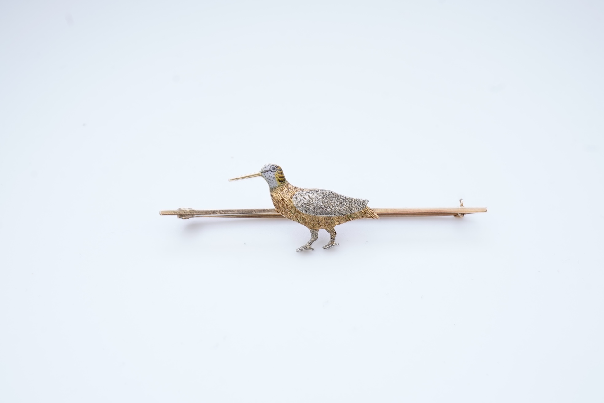 A gold and enamel brooch, circa 1900